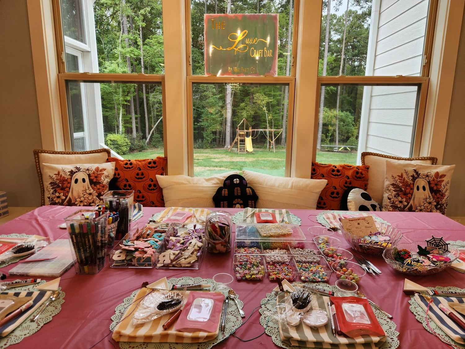 The Luxe Craft Bar: a styled craft table with beads, charms and supplies