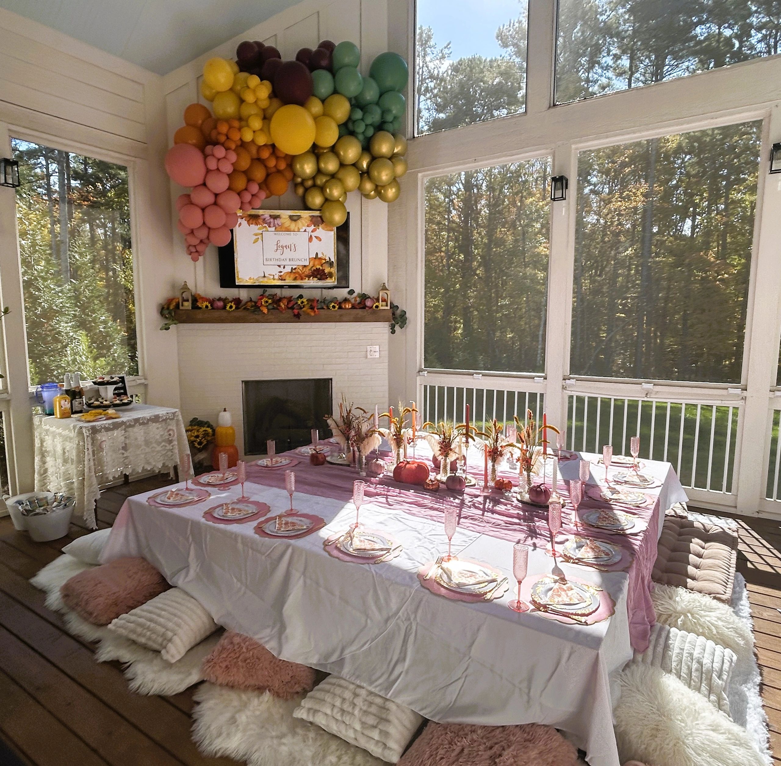 Styled picnic and balloon garland for a birthday brunch in Wake Forest